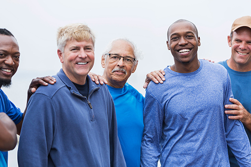 group of men smiling
