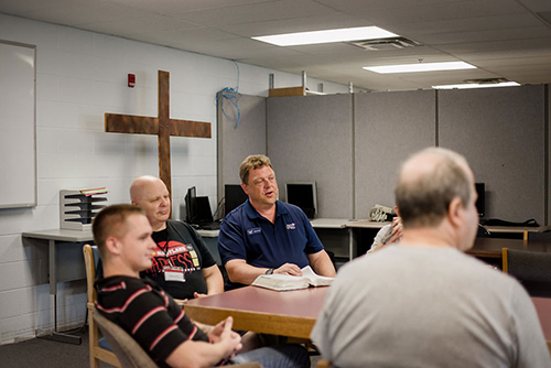 group of men talking