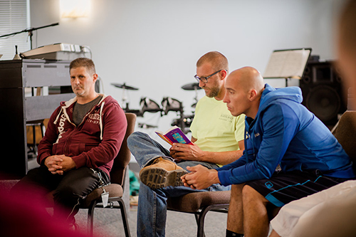 group of men talking