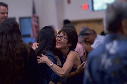 women hugging
