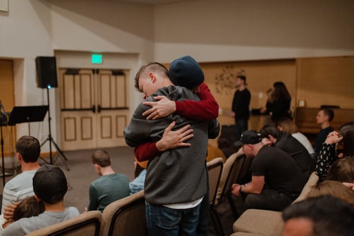 Men hugging each other
